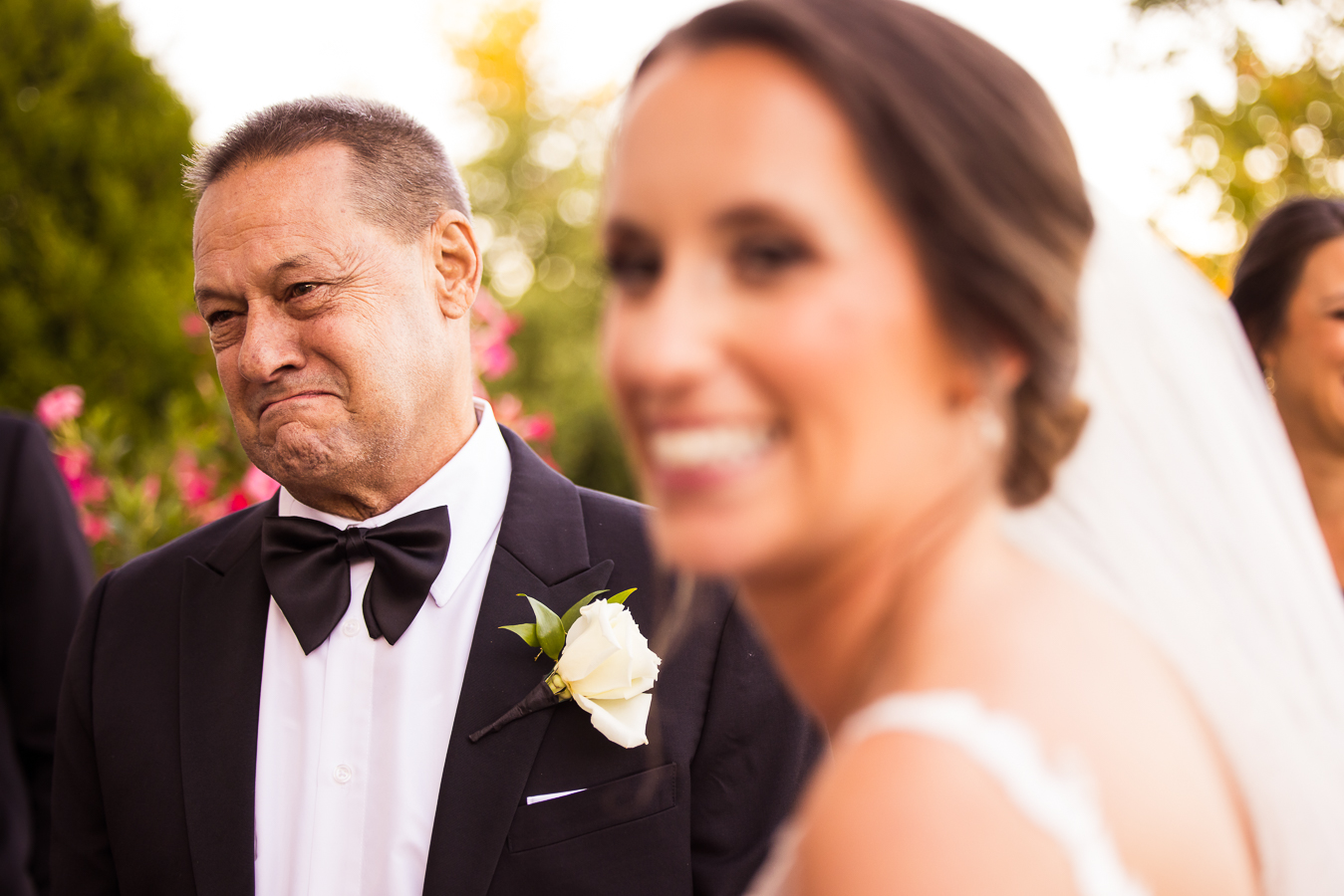 authentic wedding photographer, lisa rhinehart, captures this moment of family trying not to cry after the wedding ceremony in NJ 