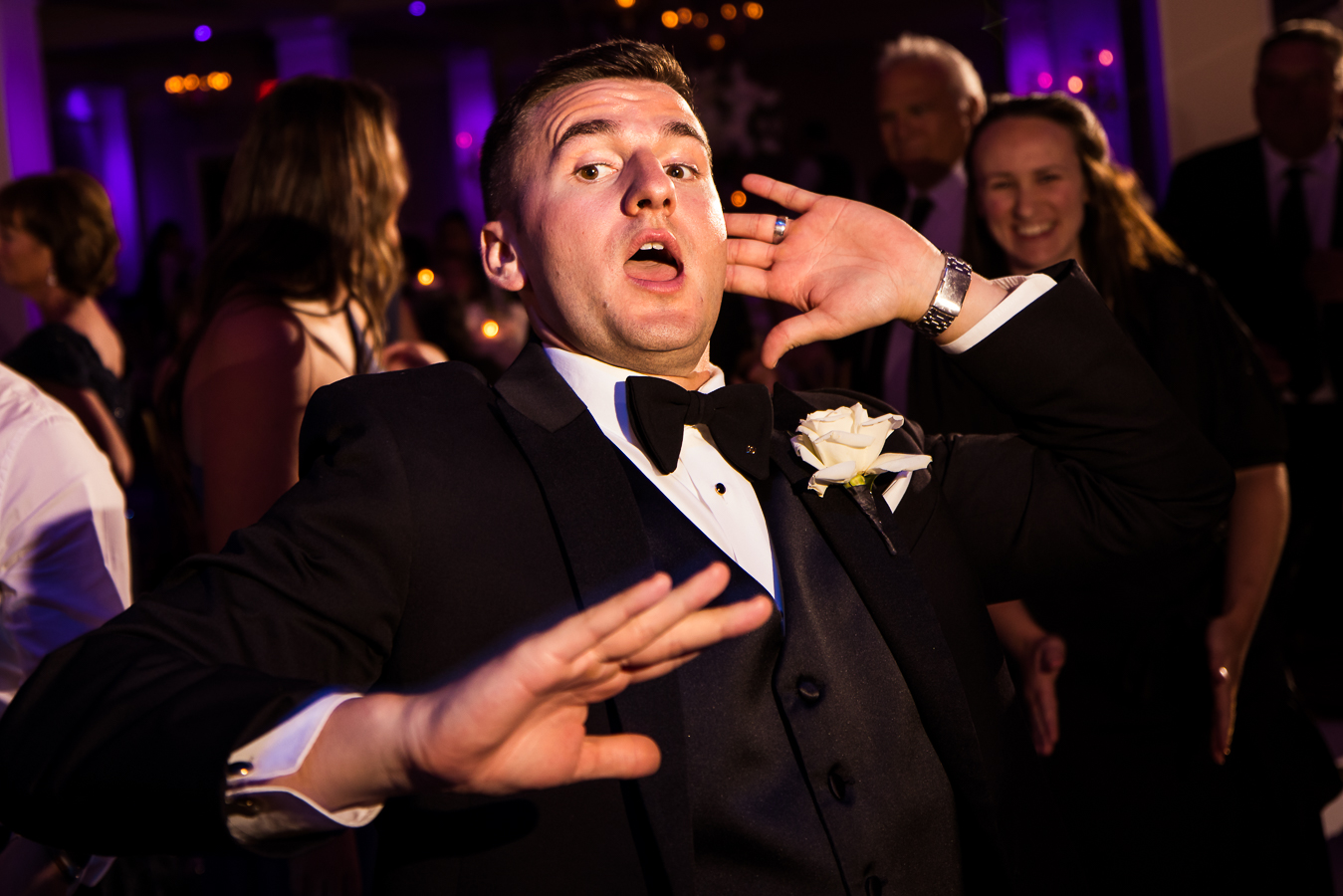 image of a groomsmen having fun and dancing during this nj wedding reception 