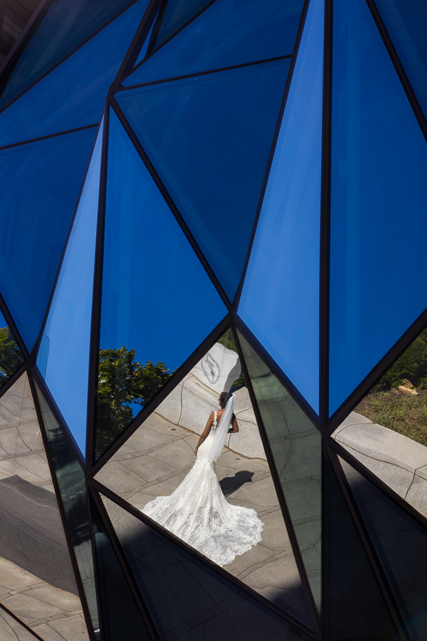 Multicultural DC Wedding photographers love creative dc wedding photographer, Lisa Rhineharts, vibrant, unique, creative portrait of the bride through mirror reflections during this wedding at st francis hall 