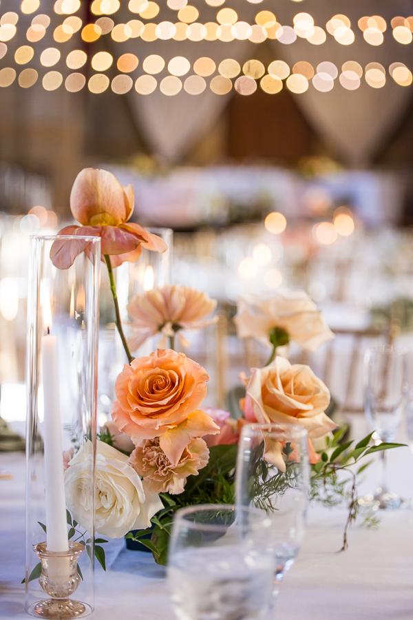 vibrant, colorful detail image of the florals on the tables at this st francis hall wedding reception in Washington DC captured by wedding photographer, Lisa Rhinehart