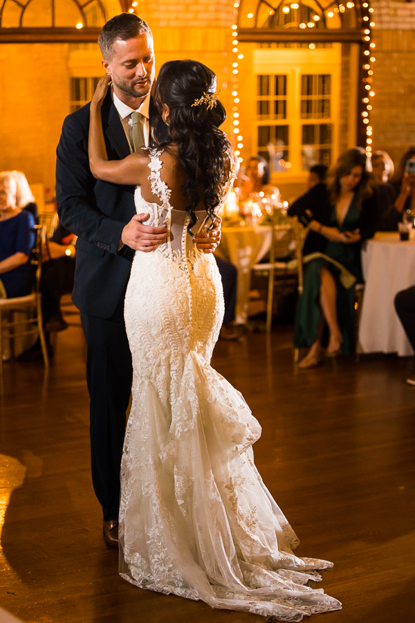 close up image of the bride and groom as they share their first dance together at their st francis hall wedding reception in Washington dc
