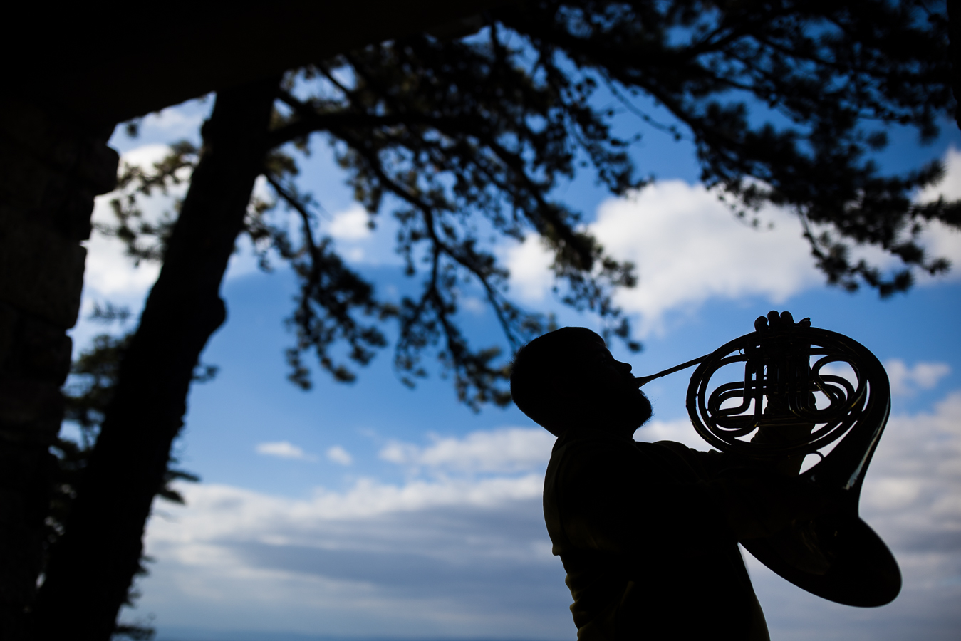 Northern York Senior Portrait Photographer, rhinehart photography, captures this unique silhouette of this french horn player as he stands on the kings gap overlook while playing his instrument 
