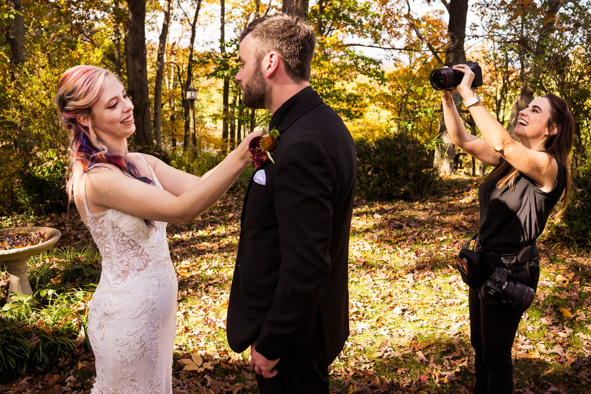 behind the scenes image of the bride and groom as they share their first look in Leesburg va