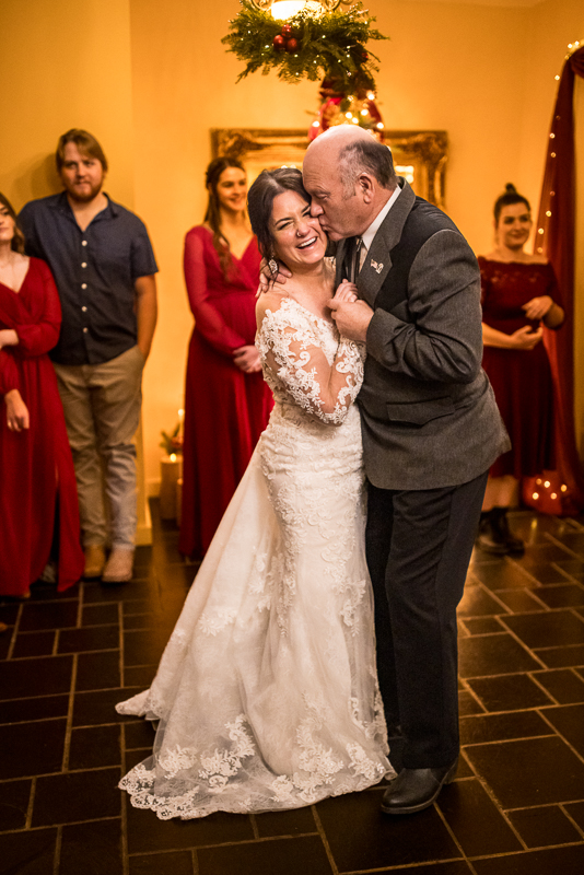 pa wedding photographer, lisa rhinehart, captures this authentic moment between the bride and her father as they share a dance together during this stroudsmoor country inn reception located in pa 