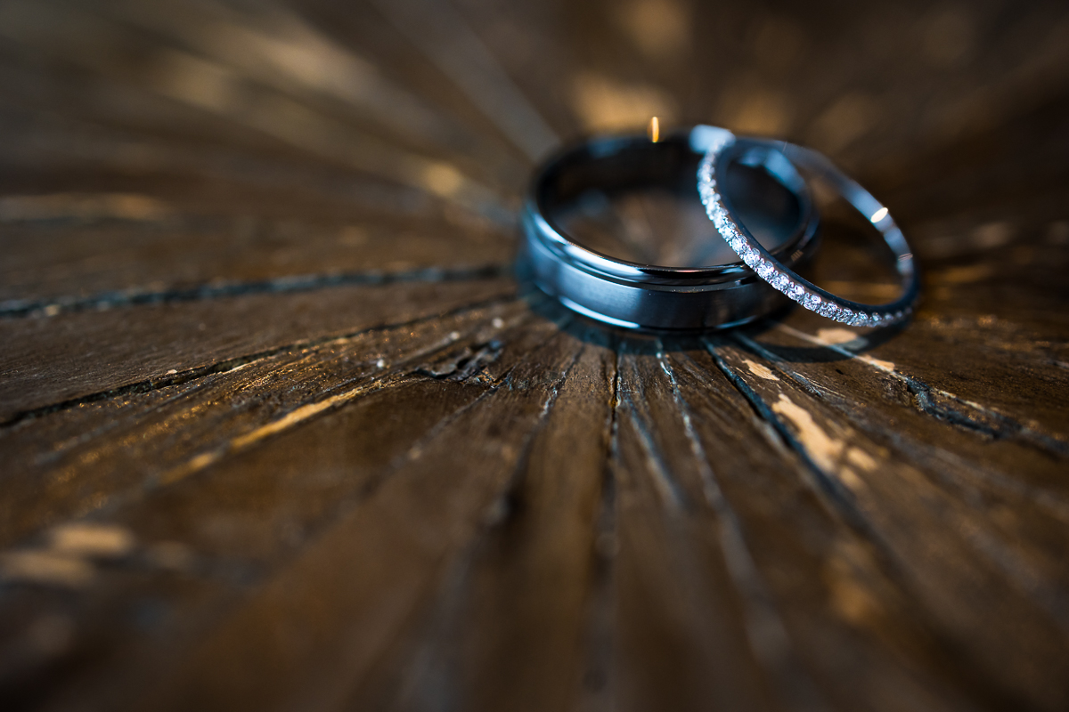 unique detail shot of the couple's rings before their winter wedding in stone harbor New Jersey at the reeds at shelter haven