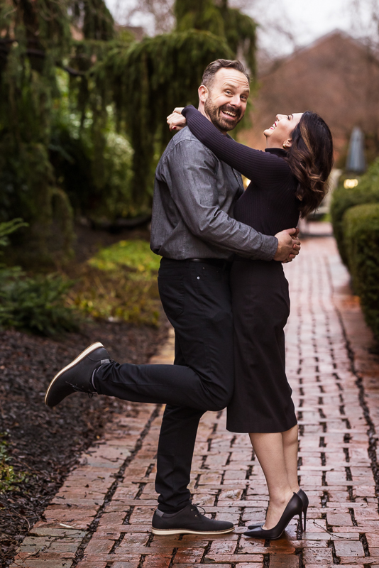 Yorktowne Hotel Wedding engagement photographer, Lisa Rhinehart, captures this fun, candid image of the couple being fun and laughing with one another during this York engagement session 